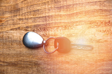 Giving and taking metal key. Video illustrates idea of renting apartment or buying houseの写真素材