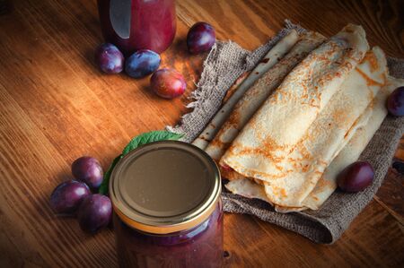 Pancakes and fresh plum jam.