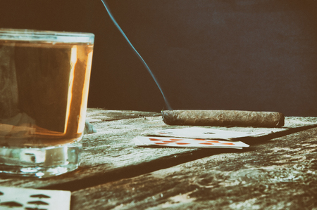 Old wooden table to play cards.の写真素材