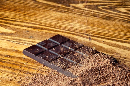 Chopped chocolate with cocoa.の写真素材