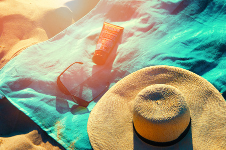 Set sunbathers lying on a towel.の写真素材