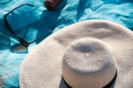 Set sunbathers lying on a towel.の写真素材