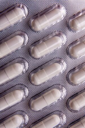 medicines in the package on a black background.
