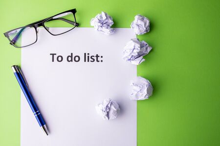 To do list in advance on a green background. Place for text.の写真素材