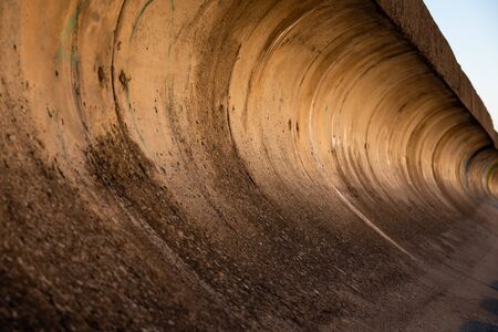 raw concrete space in sunset like ambient lighting.の写真素材