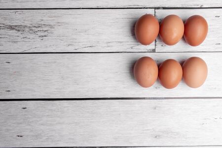 eggs on white wooden table