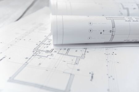 Architect rolls and architectural plan,technical project drawing.の写真素材