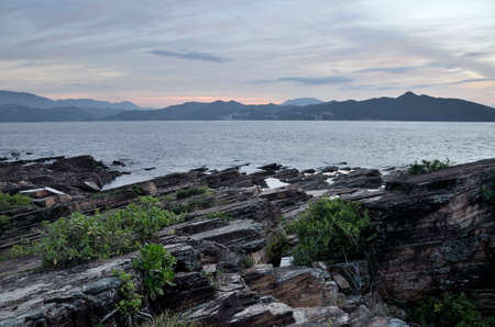 Rock in the Bay of Island under the blue skyの写真素材