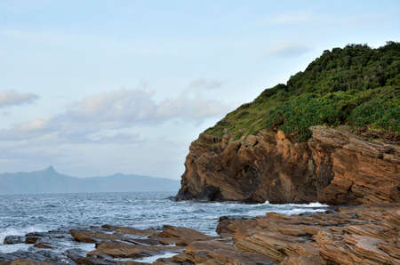 Rock in the Bay of Island under the blue skyの写真素材