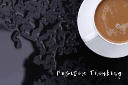 Positing thinking concept with coffee cupの写真素材
