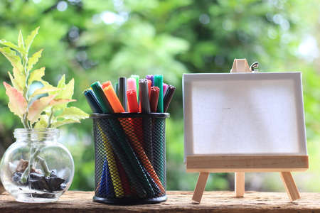 Back to Basic - business concept text on the canvas. flower pots and baskets filled penの写真素材