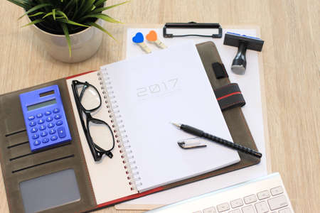 empty notebook on wooden table