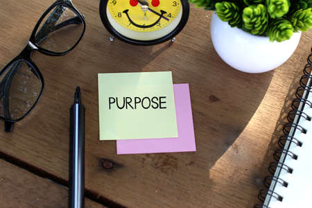 Purpose concept with paper on wooden tableの写真素材