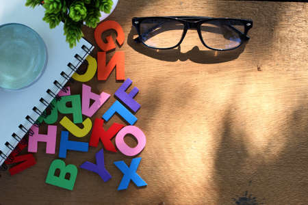 abc wood block with glasses