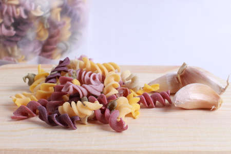 mixed vegetable pasta isolated on white backgroundの写真素材