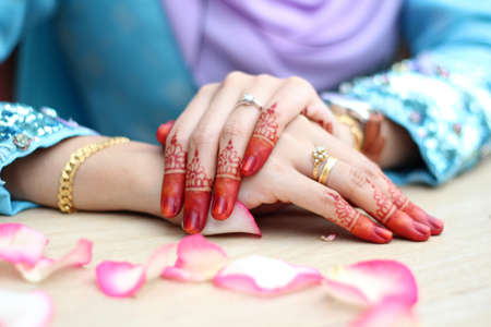 Bride hands with henna design and ringの写真素材