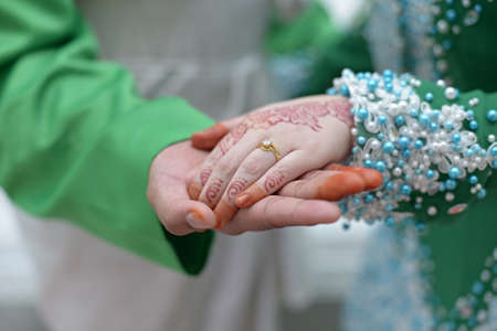 the hands of a pair of islamic bridesの写真素材