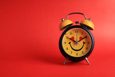 analog clock on red background