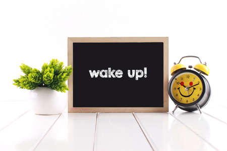 Wake up! concept with clockの写真素材