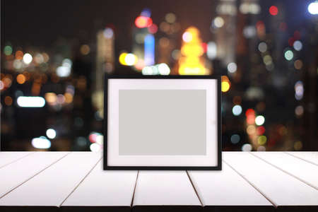 Blank frame Wooden on stage with blurred nice city as a background