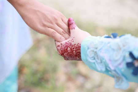 Hands of romantic couple. henna tattoo for weddingの写真素材
