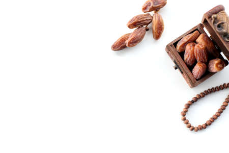 Ramadan concept. top view dates and rosary isolated on white backgroundの写真素材