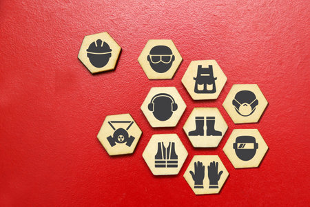 Safety gear icons on red background. Safety concept. Safety equipment.の写真素材