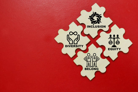 Jigsaw puzzle pieces with human resources related words on red background.の写真素材