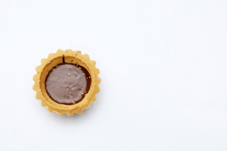 Chocolate tart isolated on white background with clipping path. Top view.の写真素材