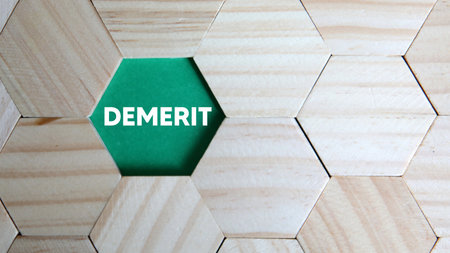 Demerit word on wood cube background. Dementia conceptの写真素材