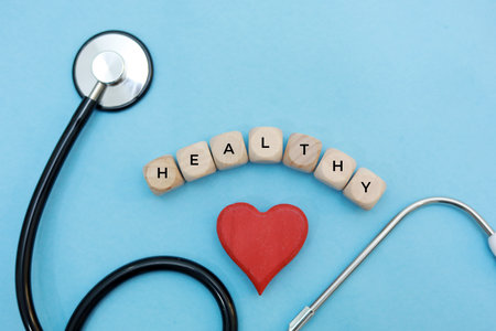 Health care concept with stethoscope and red heart on blue backgroundの写真素材