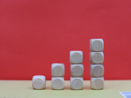 Wooden blocks on a red background with copy space for text.