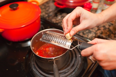 Delicious fresh red tomato pasta sauce and grated cheese の写真素材