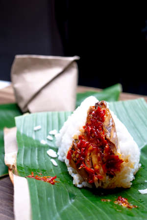 Nasi Kucing or Rice Cat, Indonesian Traditional Food, small packaging with sambal tongkolの写真素材