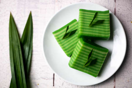 Kue lapis means layers cake, Indonesian traditional food. Made using soft rice flour pudding, it usually consists of two layers of different colors, grey and greenの写真素材