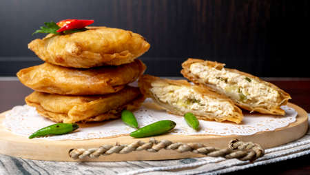 Martabak Tahu or Tofu Martabak, a spicy omelette pancake filled with bits of vegetables, leek, celery leaves, tofu and egg, Indonesian traditional foodの写真素材