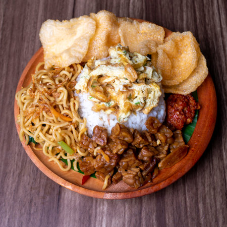 Nasi uduk or Uduk rice, traditional breakfast menu from Indonesia, served with prawn crackersの写真素材