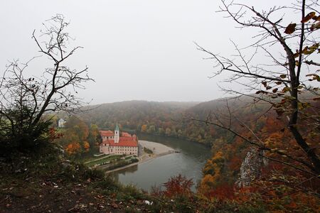 Misty view over monastery at Danube Riverの写真素材