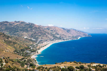 Distant view of a beach in Sicily.の写真素材