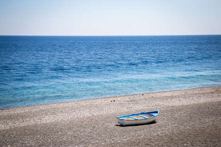 Rowboat on a Sicilian beach.の写真素材