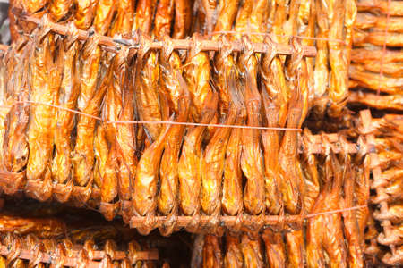 fish roasts to insert the woodの写真素材