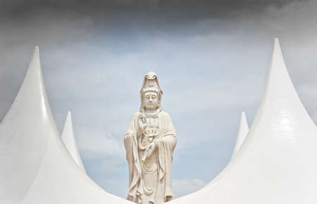 Kuan Yin statue made of marble, standing, in Thailand.の写真素材