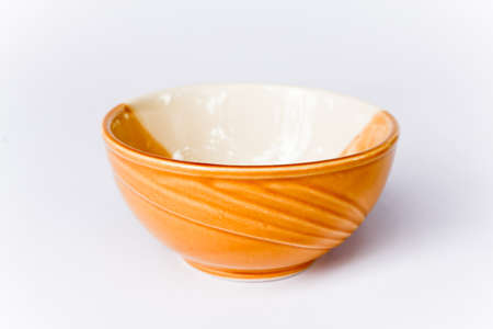 Colorful ceramic cup on a white screen の写真素材