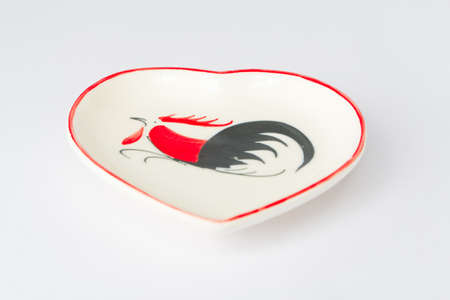Colorful ceramic cup on a white screen.の写真素材