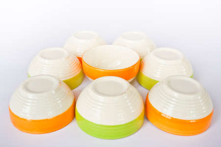 Colorful ceramic cup on a white screen.の写真素材