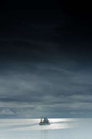 Fishing boats to shore, at Cha-am Beach.thailandの写真素材