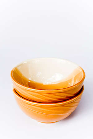 Colorful ceramic cup on a white screen.の写真素材