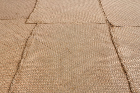An old mat on the floor.の写真素材