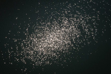 Patterns of light reflecting on water.の写真素材