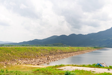 Large dam view in the midst of mountains, Thailand.の写真素材